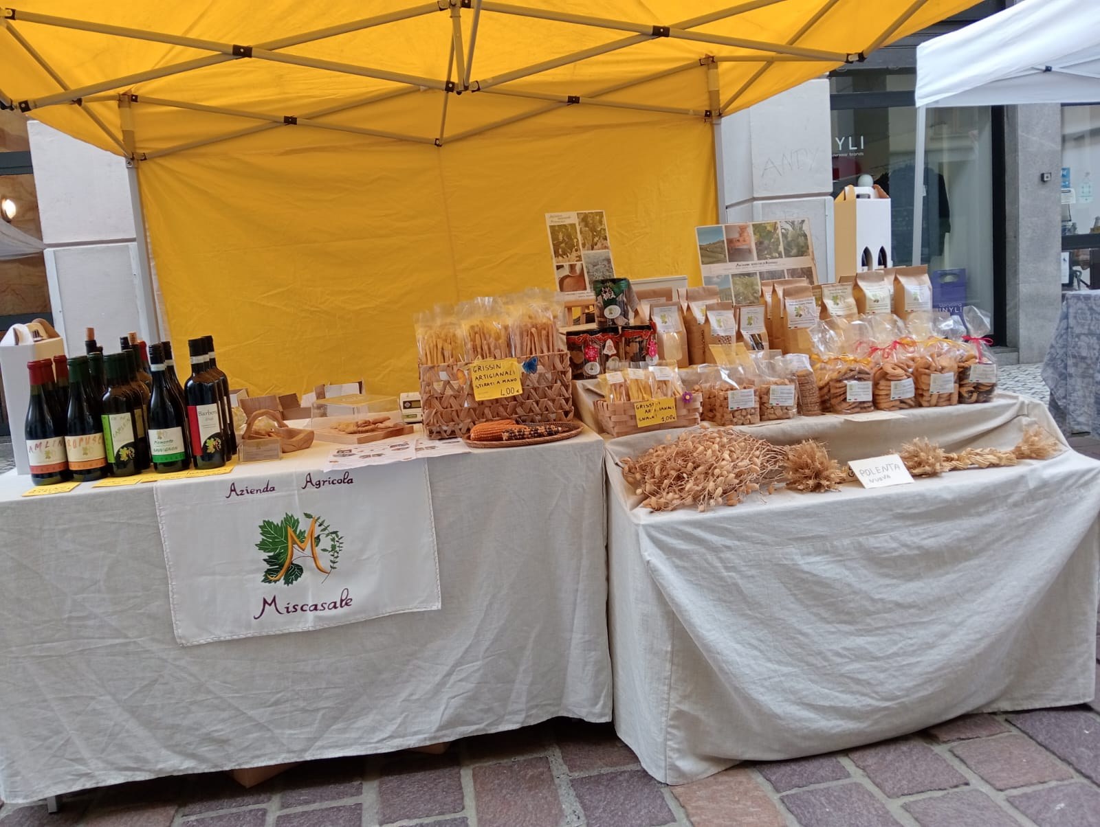 The Miscasale market stall with wines, breadsticks, flours and biscuits
